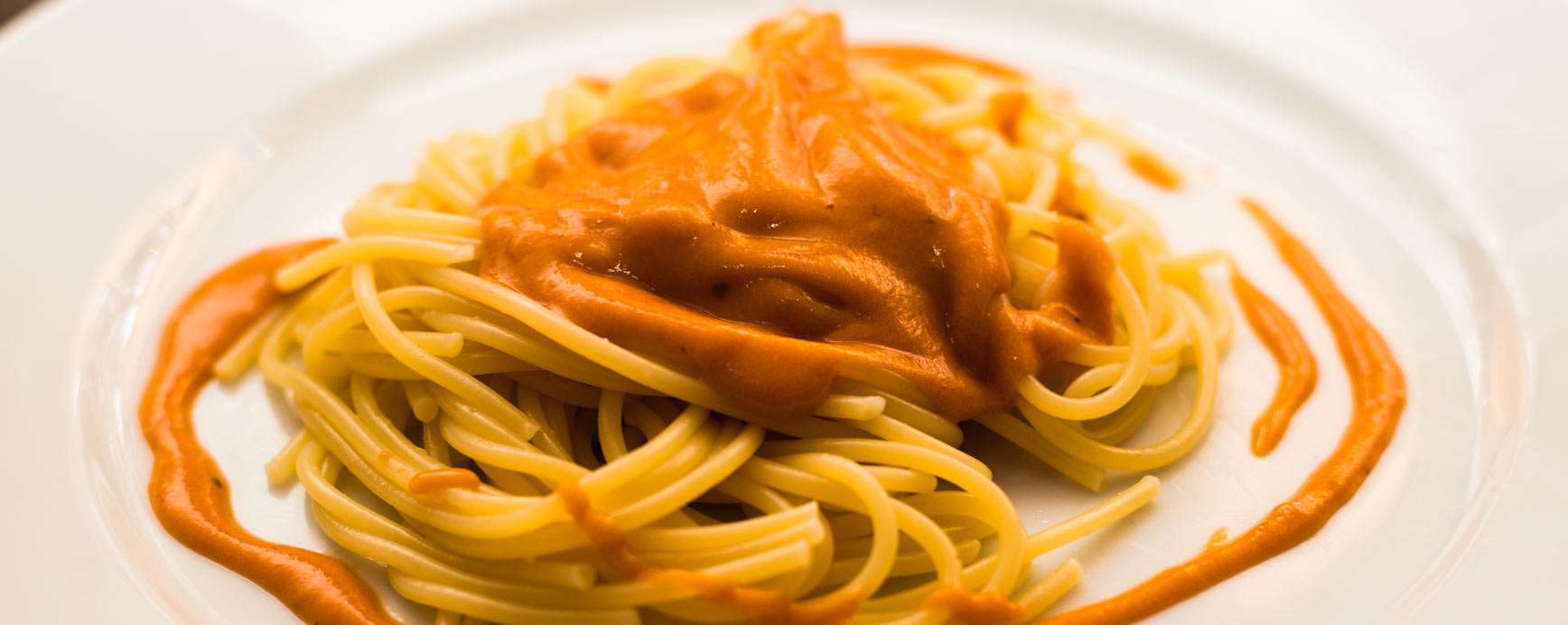 recipe spelt pasta, full of carotene, with red palm oil and tomato puree